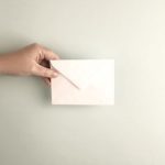 picture of person mailing a letter